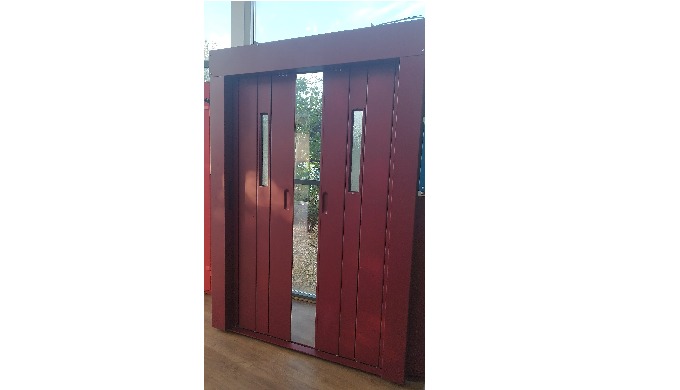 Puertas correderas automáticas de apertura central para elevadores