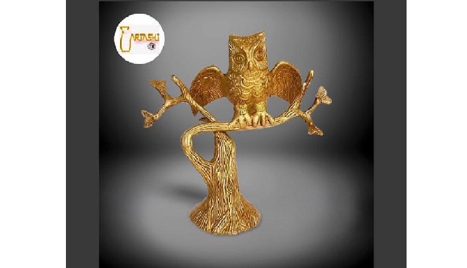Birds figurines. Item code: AMM1162. Owl sitting on tree. Handcrafted in pure brass. Finish: Polish....