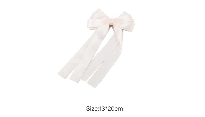 A collection of long ribbon hair accessories in various lengths and styles. Includes headbands, scru...