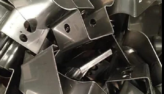Piezas dobladas, plegadas o troqueladas