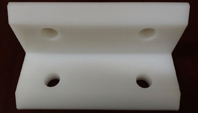 HDPE Angle Part Machining of parts in thermoplastic material according to customer specifications.
