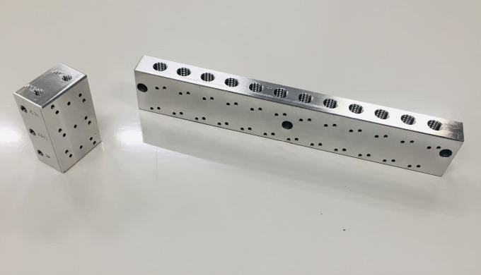 Conception et fabrication de platines pneumatiques, embases et bloc for&eacute; sur mesure