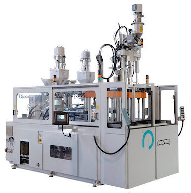 Pressa ad iniezione a 2 stazioni di lavoro indipendenti per lo stampaggio di materiali termoplastici...