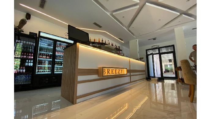 A contemporary restaurant and bar design built on elegance, comfort, and functionality. The combinat...