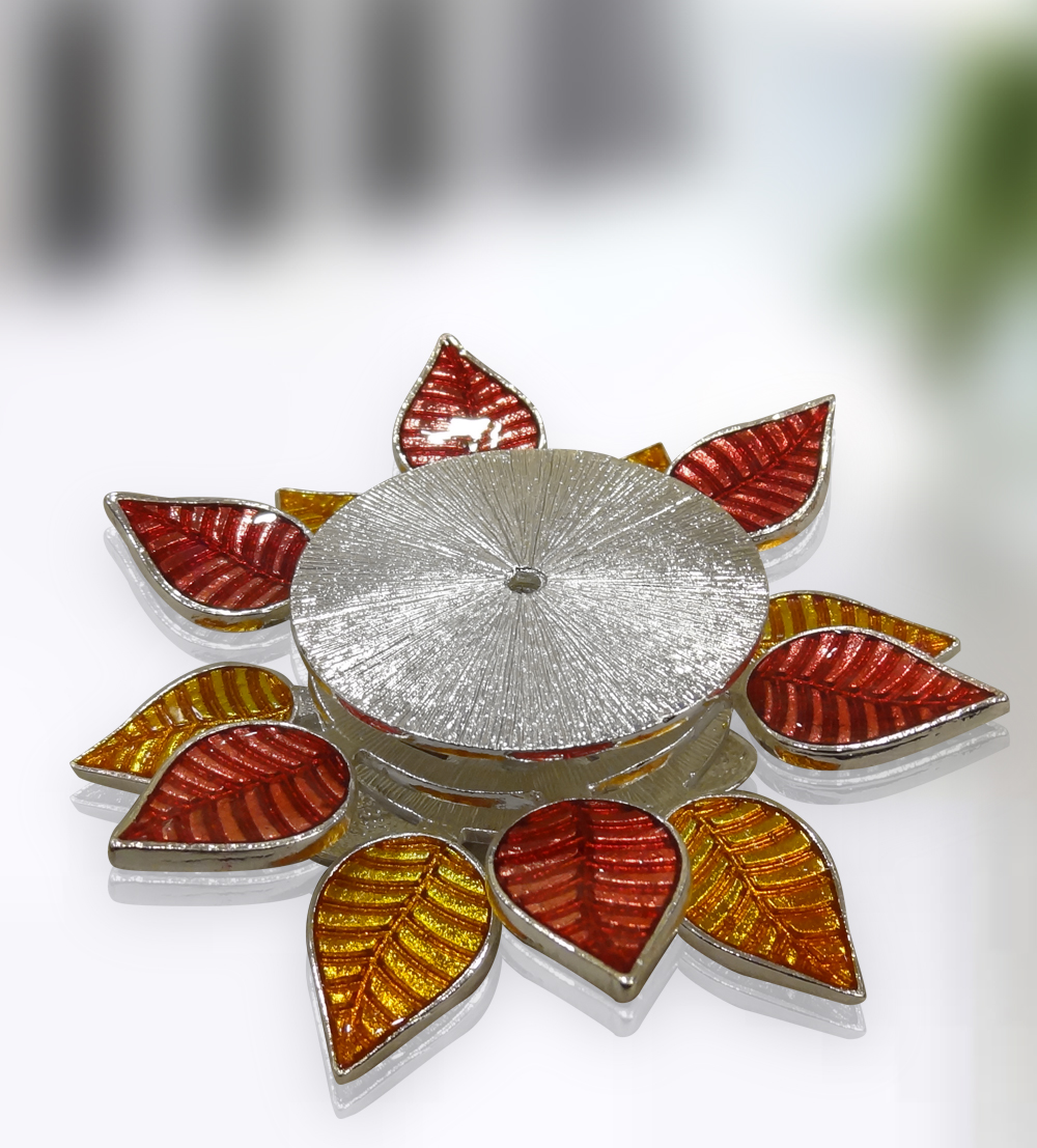 This attractive T-light adorned with beautiful orange-yellow sunrays shade leaves give it a magnific...