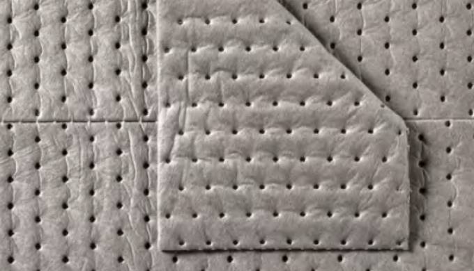 Perforated universal absorbent