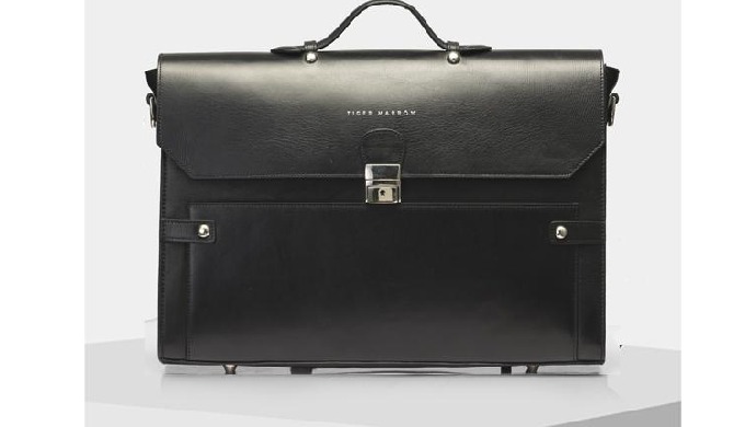Handcrafted in Natural Dry Milled and Vegetable Tanned Leather, The Money Maker is an executive brie...