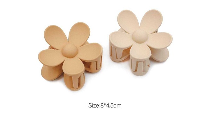 A collection of hair claw clips in curved and straight bar designs, available in sizes from 8cm to 1...