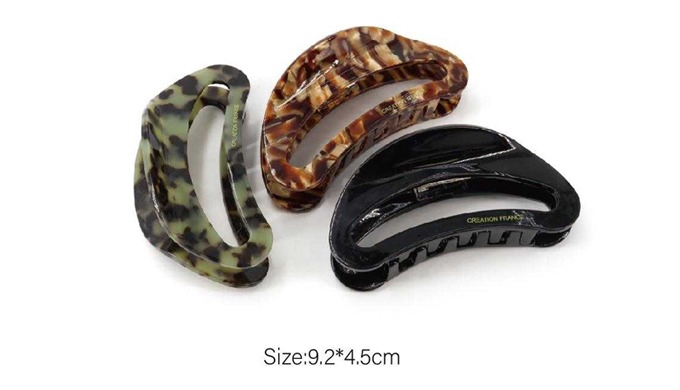 A set of hair claw clips featuring various designs and sizes. Perfect for adding a stylish touch to ...