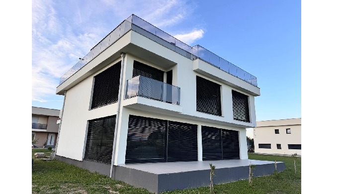 A modern residential project featuring premium PVC door and window systems made with Salamander 82 m...