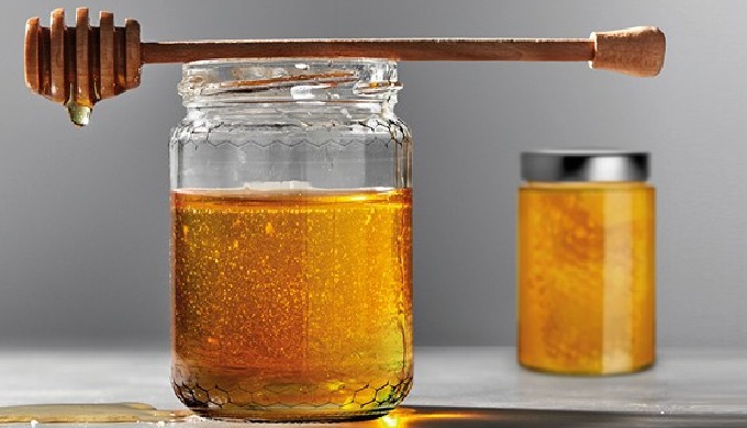 GLASS JARS FOR HONEY Glass containers for honey and royal jelly