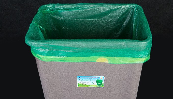 Drawstring bag on trash can