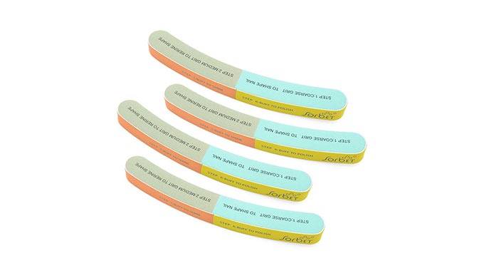 A curved nail buffer designed with multiple grits to shape, smooth, and shine nails. Each side is cl...