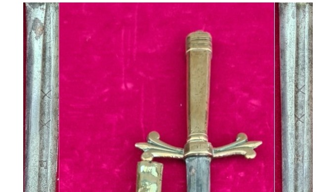 A rare named Naval dirk, Complete with its original brass scabbard with brass hanging stud. Circa 17...