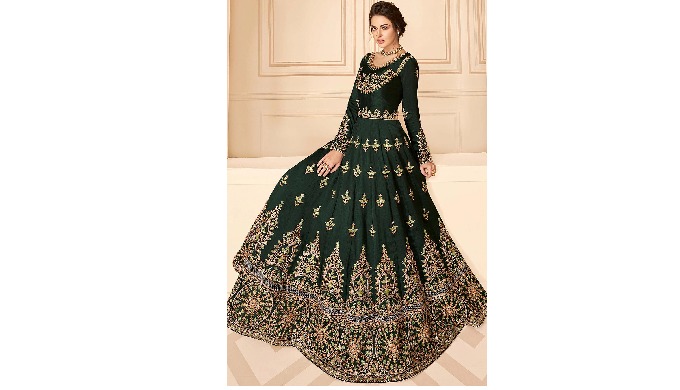 This Bottle Green Anarkali Suit is made of Silk. The full-sleeved beauty has delicate zari work all ...