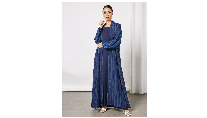 Navy Bisht Abaya is a two-piece abaya set with an open-front style and elastic sleeves, as well as a...