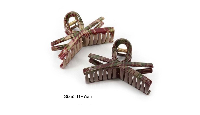 A stylish collection of hair claw clips featuring chic check patterns. Available in various sizes an...