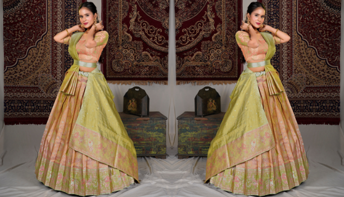 This Banarasi silk lehenga choli set from Gajiwala offers a sophisticated blend of traditional weavi...