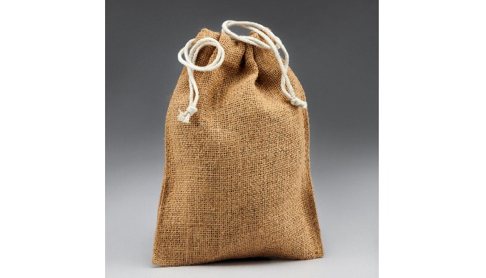 This particular product made by natural jute non-laminated. Drawstring bags look pretty, like gift w...
