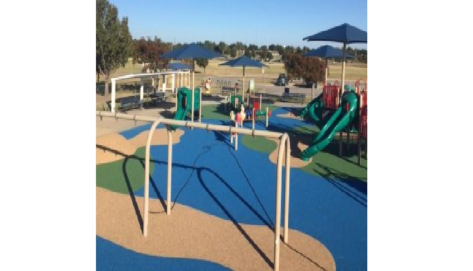 A dual-layer polyurethane surface, or pour in place, for children's playgrounds, available in differ...