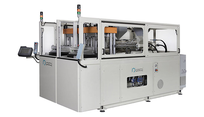 Pressa ad iniezione a 2 stazioni di lavoro indipendenti per lo stampaggio di materiali termoplastici...