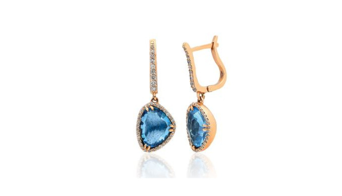 Altın 18 ayar beyaz, Pırlanta 0,33 cts 80 adet GVS pırlanta, 5,96 cts 2 adet mavi topaz kullanılarak...