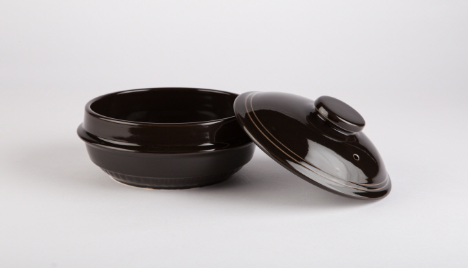 It is called ttukbaegi and non-absorbing earthen pot that was made of Heat-resistant ceramics in Kor...
