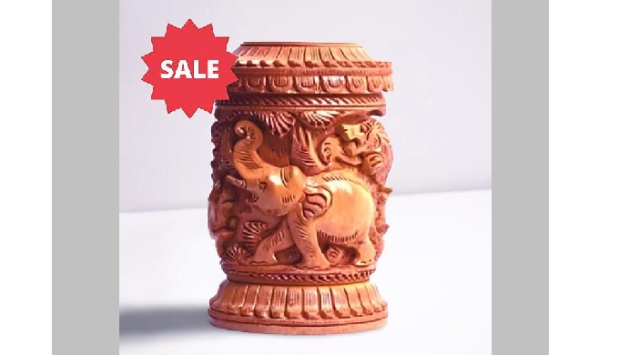 Pen stands. Item code: AKI055. Pen stand made in wood in elephant carving design. Height: 5 Inch. Di...
