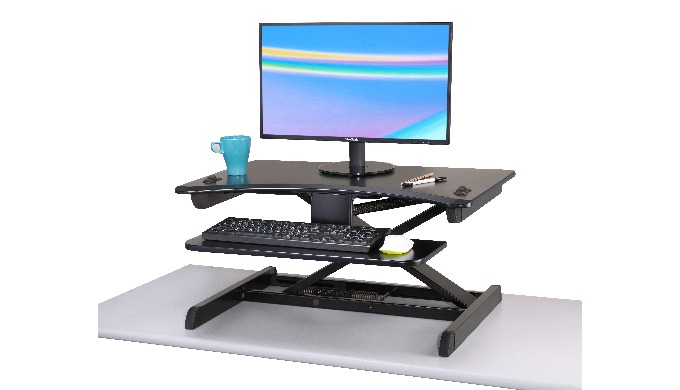 SP-104 sits on top of your current desk or quickly attached to easily create a sit-stand desk and ea...