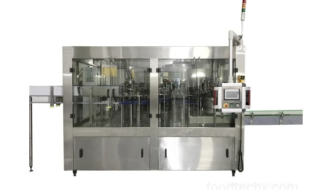 BY-XGF-14-12-5 PET bottle washing/filling/capping three-in-one machine is an Advanced 3-in-1 Solutio...