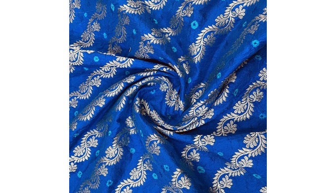 Solid silk fabric exudes luxury with its smooth, glossy surface and natural sheen. Crafted from silk...