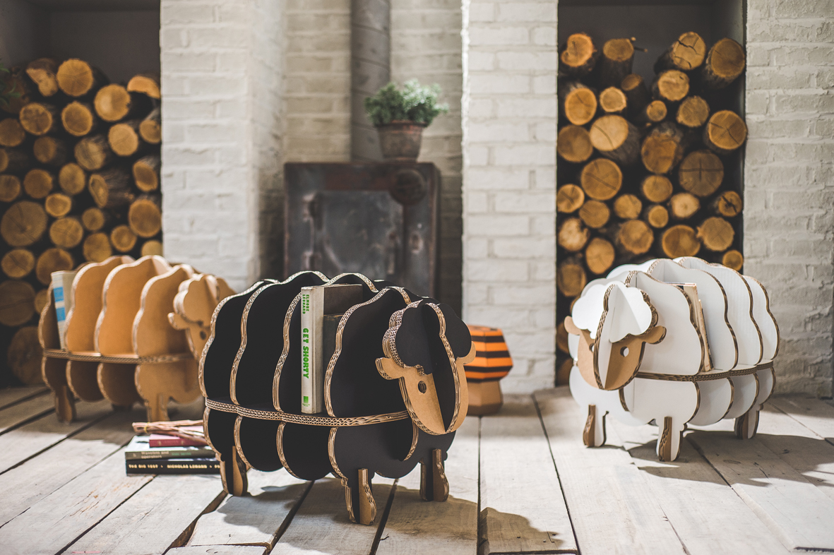 BaBa, a little sheep carrying the books.BaBa is a little bookshelf that looks like a sheep. It is ma...