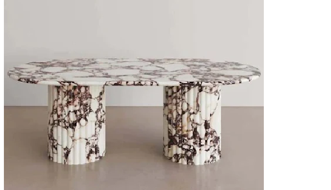 The Marx Oval Marble Coffee Table is an exquisite piece of furniture that adds grace to any living r...