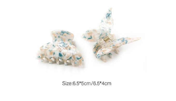 A set of hair claws in various designs and colors, combining both style and practicality. Made with ...
