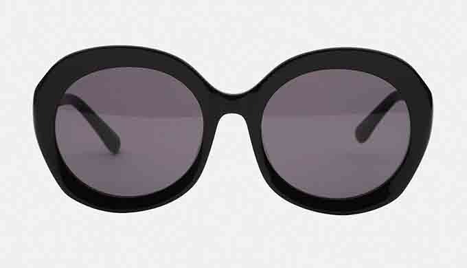 Oversized round acetate sunglass with the full acetate. It has a sensible silhouette because the fro...
