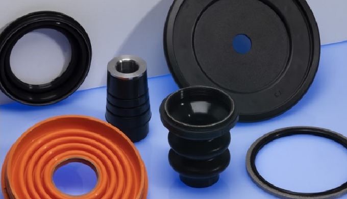 Overmolding of articles in both rubber/metal and rubber/plastic