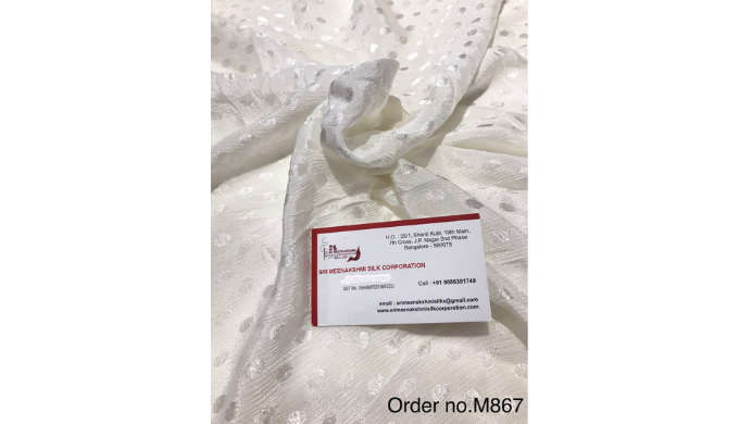 Buy Chinnon Chiffon Self Boota Fabric – White from Sri Meenakshi Silk Corporation, the trusted Manuf...