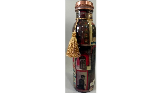 copper bottle with 900ml capacity. Comes with meena finish