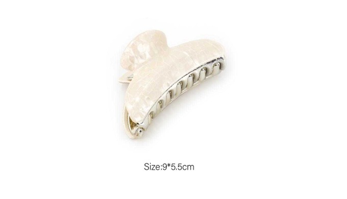 A set of hair claws ranging from clean white tones to patterned designs, perfect for various styles....