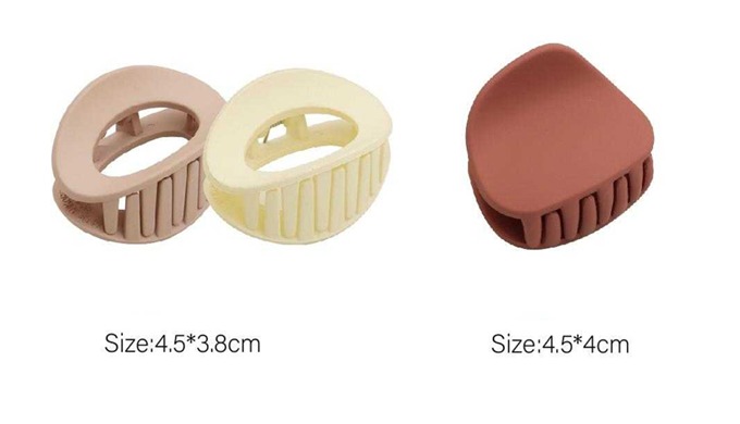 A set of mini hair claws in various sizes and designs, perfect for securing bangs or small hair sect...