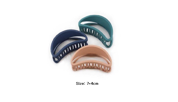 A collection of classic hair claw clips and snap clips. These items come in various materials and de...