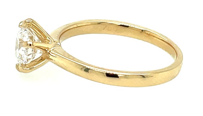 Ict round brilliant lab diamond set in a floral white gold mount on a comfort-fit yellow gold band. ...