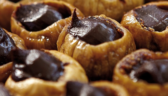 Our elegant dried fruits paired with 60% dark Belgian chocolate and assorte...