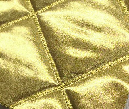• 24K gold optimized embossed woven fabric with quilt • Quilted with 4 oz filling Fabric for Clothin...