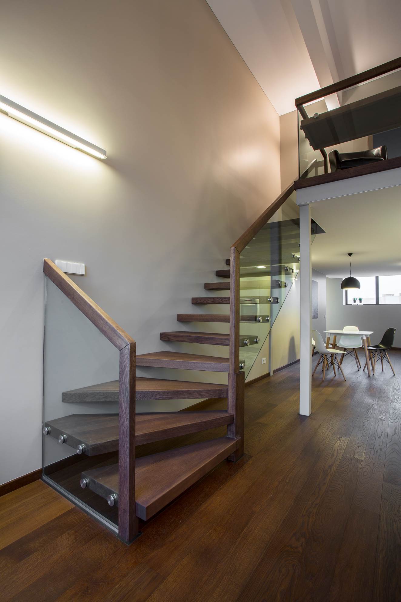 Our frameless glass balustrade with Oak Handrail was installed to this floating staircase with oak t...
