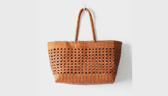 Discover the epitome of artisanal excellence with Stysion's Handmade Woven Leather Bags, proudly man...