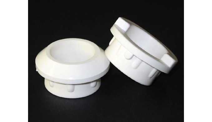 Coppia boccole sterzo per biciclette nylon bianche in plt. Con smusso per bloccaggio dello sterzo a ...