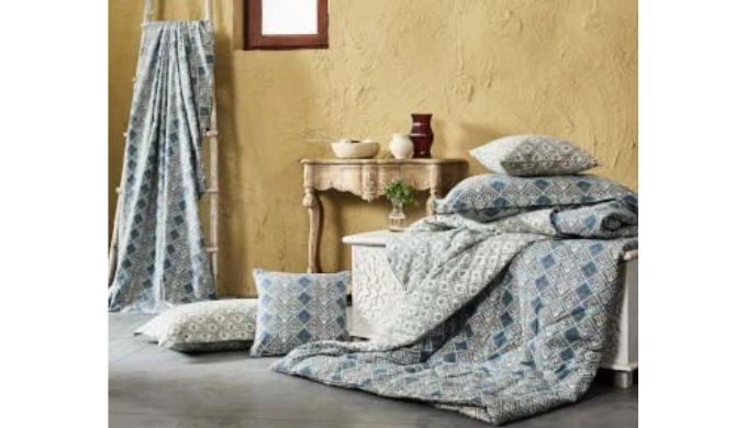 Transform your sleep experience with Trident Limited's premium bed linen collection. Crafted with me...