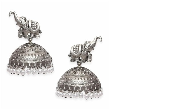 These exquisite silver-plated Jhumka earrings combine traditional craftsmanship with a contemporary ...
