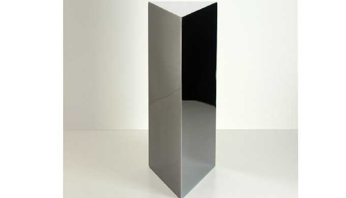 Urn in the form of a prism, the three sides represent fire, one of the four elements.